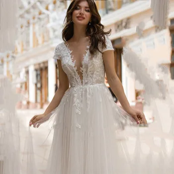 Сватбена рокля с открити рамене Дълбоко V-образно деколте копчета без облегалка Сватбени рокли 2023 Реколта апликация Тюл Разгъвка на Струйка Robe De Mariée